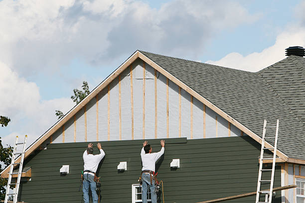 Professional Siding Contractor technician working in Parker, FL